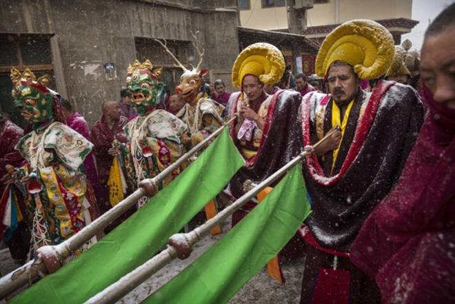 Monks take part in a procession.
