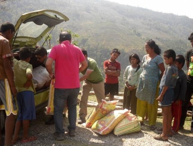 EVINS Nepal distributes rice, lentils, cooking oil, salt, and dried soybeans to a small village in Nepals Dolakha District, some 100km east of Kathmandu, where most homes were destroyed in last years earthquakes. From EVINS Nepal Facebook